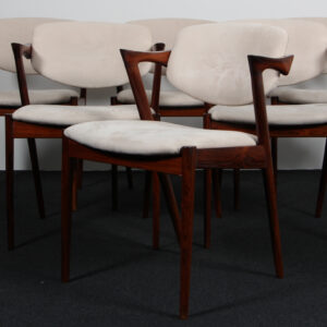 Kai Kristiansen. Sæt på seks armstole i palisander, model 42
