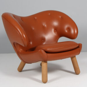 Finn Juhl lænestol, model Pelikan. Original betrukket