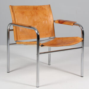 Tord Björklund lænestol af patineret læder og stål. Model Klinte