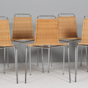 Poul Kjærholm sæt på syv stole af stål og peddigrør. Model PK1