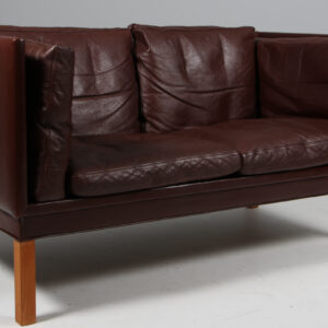 Illum wikkelsø to personers sofa af læder.