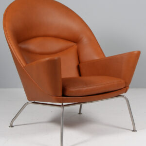 Hans J. Wegner lænestol af walnut elegance og stål. Model Oculus